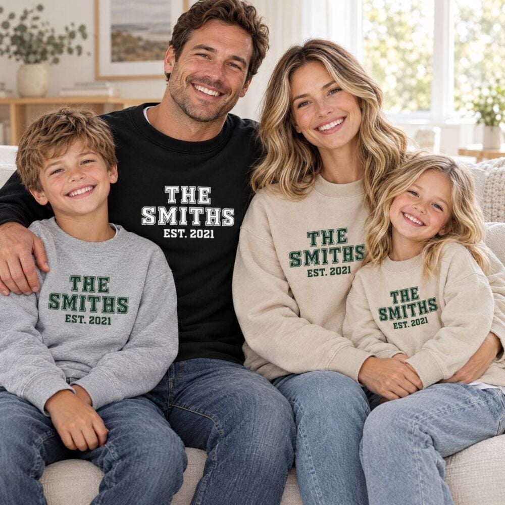 Family in matching personalised college sweatshirts reading “The Smiths est. 2021”